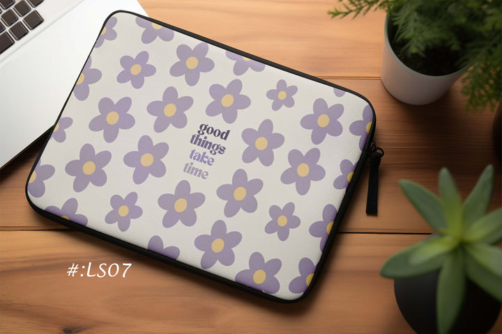 Laptop sleeve with purple and yellow flower pattern and ‘good things take time’ quote bunny store
