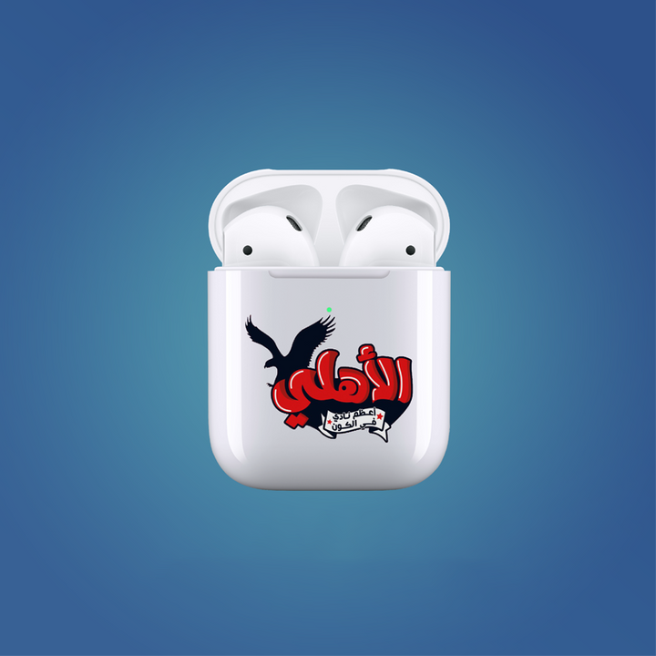 White wireless earbud case with Arabic design on a blue background AlAhly sc football club