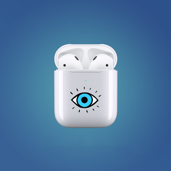 White wireless earbuds case with a blue eye design on a blue background