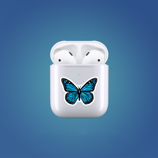 White wireless earbuds case with a blue butterfly design on a blue background