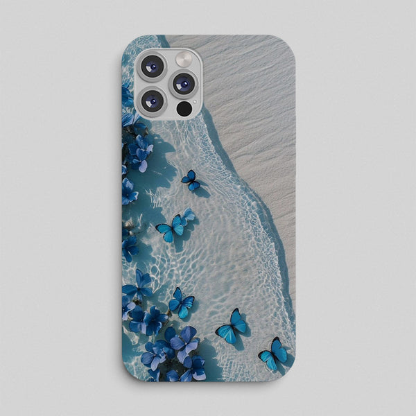 Phone case with blue butterfly design on a beach background