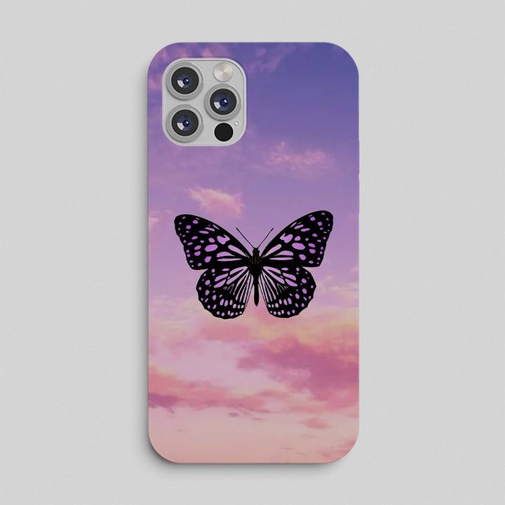 Phone case with a butterfly design on a purple and pink sky background