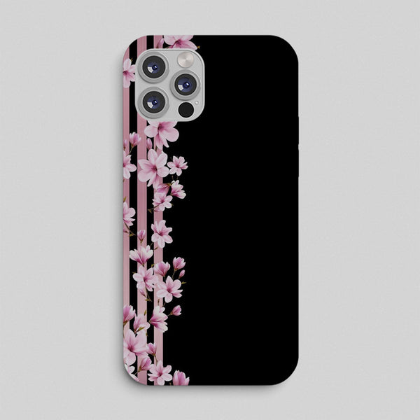 Phone case with pink floral design on a black background
