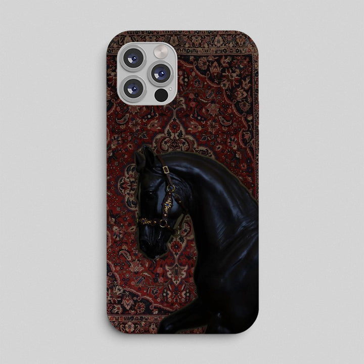 Phone case with a horse head design on a patterned rug