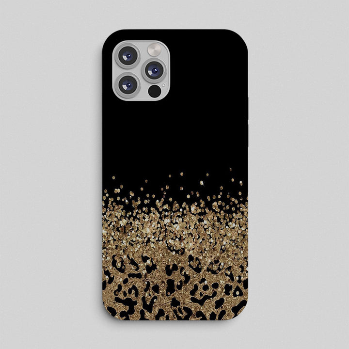 Phone case with black and gold leopard print design on a light gray background