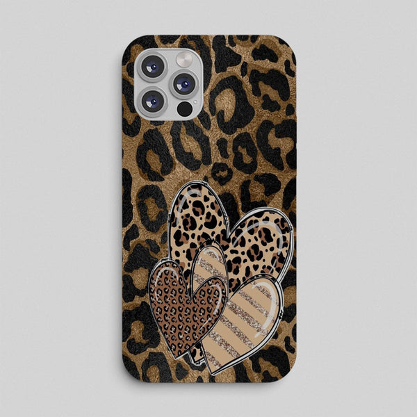 Phone case with leopard print and heart design on a gray background