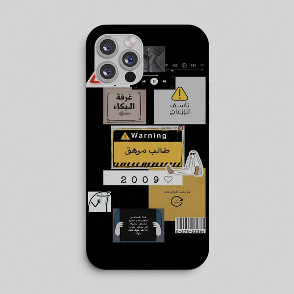 Phone case with various labels and icons on a black background
