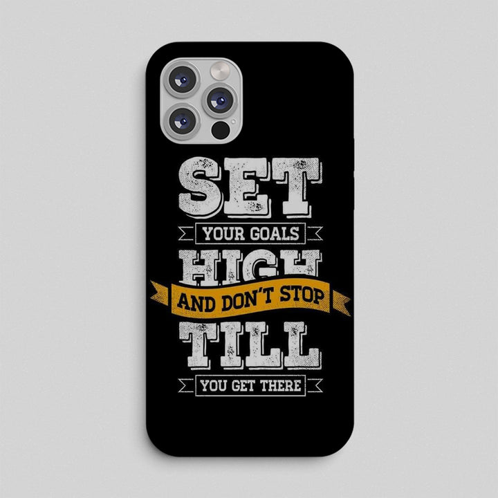 Phone case with motivational quote on a gray background