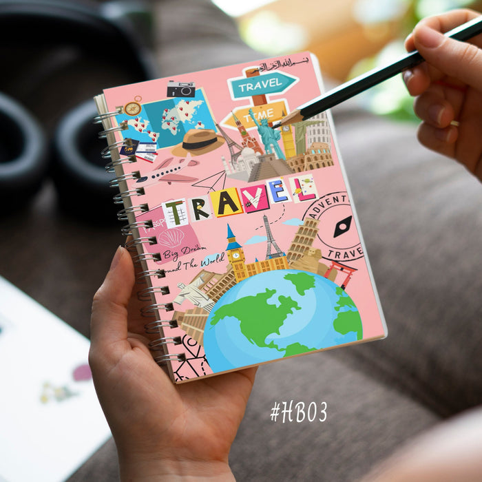 Travel Adventure Notebook, pink spiral notebook with "Travel" collage, globe and landmarks