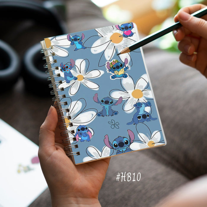 Stitch and Flowers Notebook, spiral notebook with Stitch among white daisies on blue