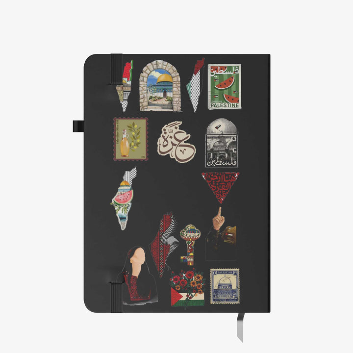 Hardcover notebook with black cover decorated in Palestine-themed stickers, maps, Arabic calligraphy, landmarks, and cultural symbols